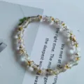 Bracelet de perles de style chinois avec perles transparentes et accents dorés, bijoux élégants - Bouteille - Transparent