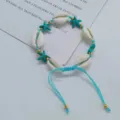 Bohemian natural shell braided bracelet with turquoise starfish beads and adjustable wax cord. - Blue Cord Starfish