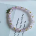 Nouveau bracelet de perles de bambou rose de style chinois avec des perles dorees bijoux - Bouteille - Violet