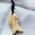 Natural crystal fish pendant necklace with woven black rope, elegant jewelry accessory for women. - Crazy Lace Agate