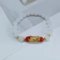 Nouveau bracelet de perles blanches de style chinois avec dragon doré pour femmes. - Blanc
