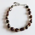Natural irregular crystal stone bracelet with gold beads and silver extension chain. - Garnet