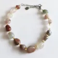 Natural irregular crystal gemstone chip bracelet with metallic beads and extension chain for women. - Indian Agate