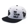 Close-up of 3D 'BE YOUR SELF' embroidery on white and black flat brim baseball cap - Adjustable / White Black Patchwork Style (3)