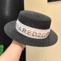 Summer straw hat with black flat top and white letter ribbon for beach vacation sun protection. - Adjustable / Black