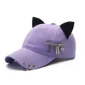 Purple baseball cap with black cat ears and punk style metal rings and charms for daily wear. - Adjustable / Blade / Purple
