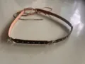 Brown leather strap accessory with metal stars and studs, retro hat or belt decor variant. - Brown Faux Leather Band With Metal Star Ornaments And Rivets