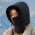 Detail shot of winter warm integrated balaclava down cap with soft fur lining and drawstring. - One Size / Black