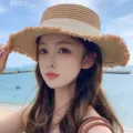 Stylish straw sun hat for women with wide brim and ribbon detail, perfect for beach summer wear. - M (56-58cm) / Khaki White Ribbon
