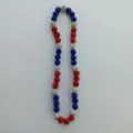 Detailed closeup of the red white and blue rhinestone crystal ball beaded necklace sparkling design. - 10mm Beads / Style 1