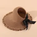 Summer knitted empty top sun visor hat with wide ruffled brim and elegant black bow for women. - Adjustable / Khaki