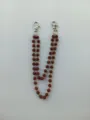 Close-up detail of a 12mm brown rhinestone disco ball chain with silver swivel hooks - Style 10
