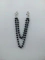 Detail view of a double-layered black rhinestone bead chain with silver lobster clasps - Style 12