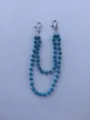 Detail view of the 12mm blue sparkling rhinestone ball chain with silver metal clasps. - Style 13