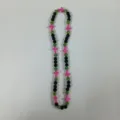 Detailed view of the colorful beaded necklace featuring black, green sparkle balls, pink cross charms. - 10mm (5 Rows) / Pink Green and Black Cross Style (14)
