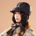Stylish black winter warm down trapper hat with windproof earflaps and cute chin bow tie. - M (56-58cm) / Black