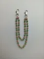 Detail of 12mm green and champagne rhinestone bead double-strand hip hop pants chain. - Style 17