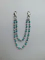 Close-up of 12mm blue and white rhinestone bead double pants chain with silver clasps - Style 21
