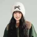 Women winter warm plush knitted beanie hat with cute black bow embroidery style casual. - One Size / White