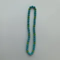 Detailed close-up of colorful rhinestone bead chain strand showcasing sparkling texture. - 10mm Beads / Style 2