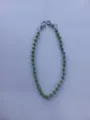 Green rhinestone Shamballa bead chain strap detail showing sparkling crystal ball design. - 10mm 5-Row Rhinestone Disco Balls / Color 15