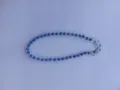 Detailed close-up view of the sparkling blue rhinestone shamballa ball chain with metal hooks. - 10mm 5-Row Rhinestone Disco Balls / Color 14