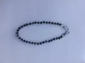Close-up detail of sparkling black rhinestone shamballa bead chain strap for pants or bags. - 10mm 5-Row Rhinestone Disco Balls / Color 12