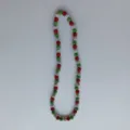 Detailed view of a Christmas style red green silver crystal ball beaded shamballa necklace. - Shamballa Style (p5662) / 10mm Beads, Approx 56 Beads, 54cm, 5 Rows of Rhinestones / Red, Green, and Silver White