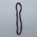 Red and black crystal disco ball Shamballa necklace detail view showing bead texture and color. - Shamballa Style (p5662) / 10mm Beads, Approx 56 Beads, 54cm, 5 Rows of Rhinestones / Red and Black