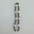 Close-up detail of the sparkling purple and gold beaded strand with white cross charms. - 10mm Beads, Approx 56 Beads, 54cm(21.25inch), 5 Rows / Style 70