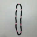 Detail view of a hip-hop style Shamballa beaded necklace with black balls and pink cross accents. - 10mm Beads, Approx 56 Beads, 54cm(21.25inch), 5 Rows / 91
