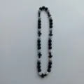 Close-up detail of the black and silver shamballa beaded necklace featuring cross accents. - 10mm Beads, Approx 56 Beads, 54cm, 5 Rows of Rhinestones / Black and Silver with Black Cross (99)