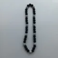 Black and silver Shamballa rhinestone clay bead necklace elastic design detail view. - 10mm 5 Rows / Black and Silver Mixed