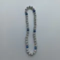 Detailed view of rhinestone paved shamballa bead necklace in silver and blue sparkle design. - 10mm 5 Rows (56 Beads / 54cm) / Silver and Blue Color Block Style (115)