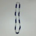 Detailed view of blue and silver rhinestone disco ball necklace with white cross beads for women. - 10mm Beads, Approx 56 Beads, 54cm(21.25inch), 5 Rows / 96