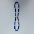 Detailed close-up view of blue and silver rhinestone disco ball clay beads necklace. - 10mm Beads, Approx 56 Beads, 54cm (21.25in), 5 Rows / Style 109