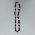Detail view of Shamballa-style red and silver rhinestone beads necklace with black cross charms. - 10mm Beads, Approx 56 Beads, 54cm(21.25inch), 5 Rows / 120