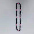 Detail view of black beaded necklace featuring pink cross charms for a unique hip hop style. - 10mm Beads, Approx 56 Beads, 54cm(21.25inch), 5 Rows / No.59