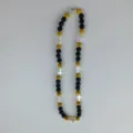 Shamballa necklace detail featuring black and gold rhinestone beads with silver cross spacers. - 10mm Beads, Approx 56 Beads, 54cm(21.25inch), 5 Rows / 123