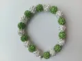 Green and white crystal rhinestone clay ball stretch bracelet detail view, elegant shine. - No. 22