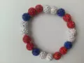 Macro view of 10mm red white and blue rhinestone clay bead stretch bracelet for fans - No. 19