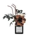 Difusor de aroma negro con flores secas y aceites esenciales para decoración del hogar. - Té de Jazmín