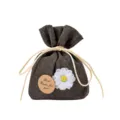 Fabric sachet bag with white flower decoration and drawstring design for wardrobe and car fragrance. - Cologne