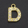 Gold-tone letter D pendant charm featuring sparkling rhinestones and metal details. - Letter D / Gold