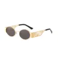 Occhiali da sole vintage ovali con montatura in metallo dorato traforato e lenti scure - Montatura Oro Lenti Grigie