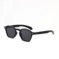 Retro round frame sunglasses with black frames and metal rivet accents on the hinges. - Bright Black / Gray