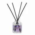 Aromatherapy glass bottle with purple liquid and black diffuser reeds for home decor. - 50ml / Lavender