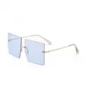 Trendy oversized square rimless sunglasses with blue tinted lenses and gold metal temples - Blue
