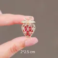 Sweet strawberry brooch with red crystals and gold metal, elegant suit accessory 2x2.5cm - Strawberry / Gold