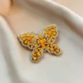 Vintage gold-tone amber crystal rhinestone butterfly brooch elegant suit jacket accessory - 918#